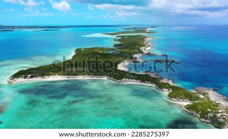 A  beach in the Bahamas .
Tropical landscape. White sand, azure sea and blue sky.  A corner of paradise.