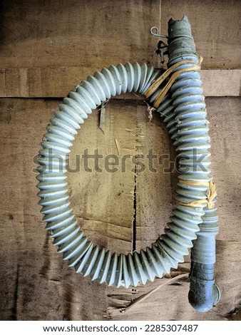 Texture of the washing machine water drain hose tool