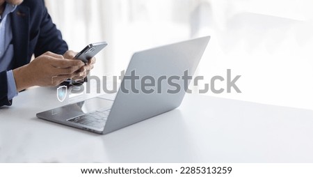 Businessman typing on keyboard laptop computer to input username and password for or technology security system and prevent hacker increases the security of your account concept.	