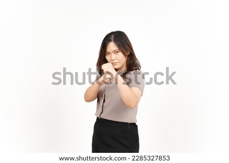 Punching fist to fight Of Beautiful Asian Woman Isolated On White Background Royalty-Free Stock Photo #2285327853