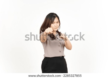 Punching fist to fight Of Beautiful Asian Woman Isolated On White Background Royalty-Free Stock Photo #2285327855