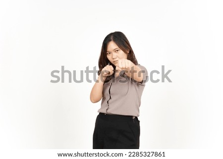 Punching fist to fight Of Beautiful Asian Woman Isolated On White Background Royalty-Free Stock Photo #2285327861