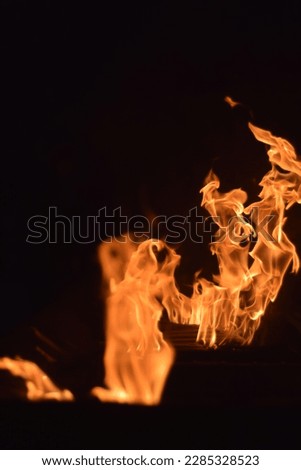 Pictures of fire by burning candles
