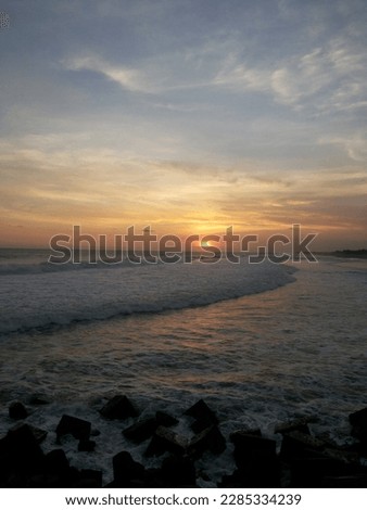 Sunset on Glagah beach in Yogyakarta, Indonesia