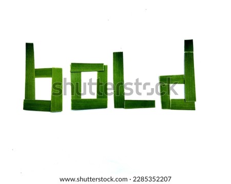 Bold green font isolated on white background. real tree leaves set perfect font.