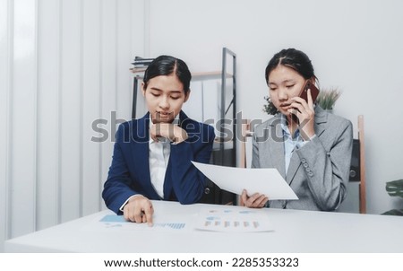 Young Asia female leader business woman coaching new smes bookkeeping audit accounting interview with trainer training business job.