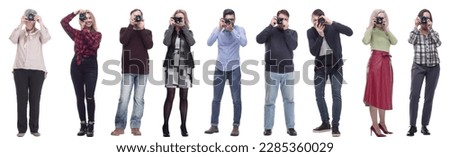 Many Double Twelve Group paparazzi photographers with cameras