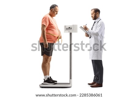 Doctor checking weight and mature man standing on a weight scale isolated on white background Royalty-Free Stock Photo #2285386061