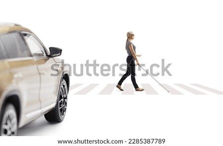 Vehicle approaching a pedestrian crossing and a blind woman walking with a stick isolated on white background