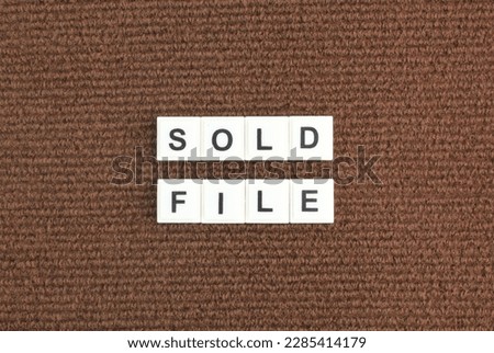 letters of the alphabet with the word sold file. sold file concept. jpeg, vector or png format files