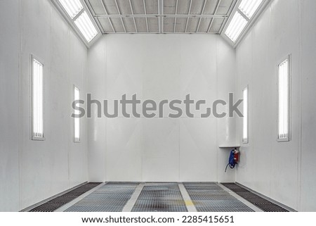 Car service concept.Spray paint cabinet for car body or vehicles painting or parts in a car repair station.  Royalty-Free Stock Photo #2285415651