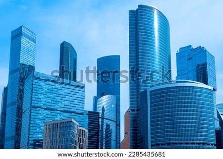 Moscow-city. Cities of Russia. Bottom view of skyscrapers in center of Russian capital. Business center of Moscow. Office rental in Moscow. Office real estate. High-rise buildings against blue sky Royalty-Free Stock Photo #2285435681