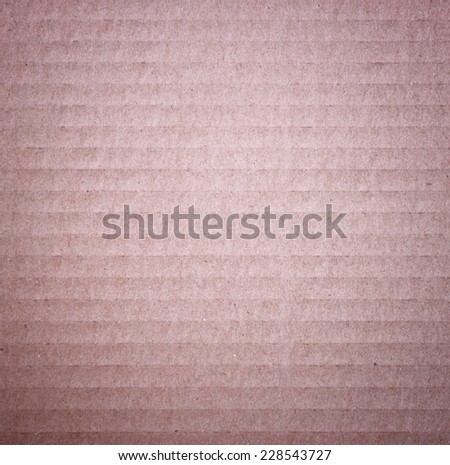 cardboard background with delicate stripes. 