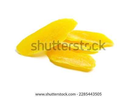 Dehydrated mango slices isolated on white background. Dry candied mango fruit chips closeup Royalty-Free Stock Photo #2285443505