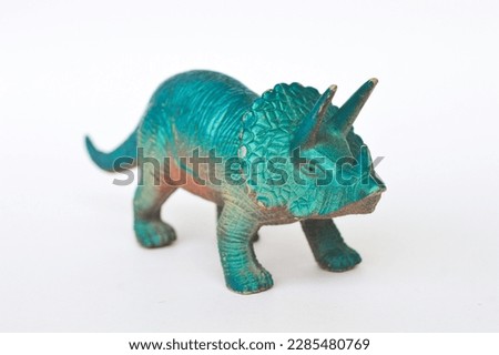 Miniature Triceratops which is a type of large, three-horned dinosaur isolated on a white background