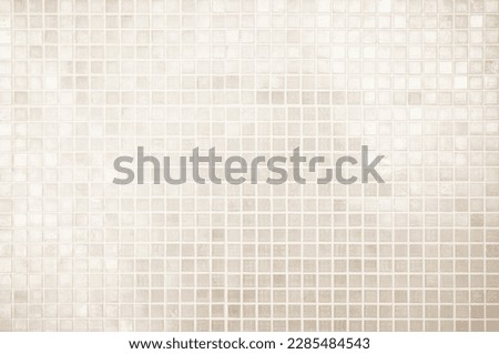 Cream light ceramic wall chequered and floor tiles mosaic background in bathroom, kitchen. Design pattern geometric with grid wallpaper texture decoration pool. Simple seamless abstract surface clean. Royalty-Free Stock Photo #2285484543