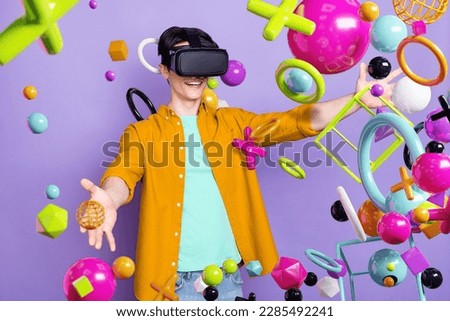 Artwork collage picture of excited guy use experience virtual reality goggles arms touch flying metaverse elements isolated on purple background