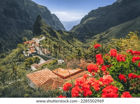 Mountain village in Masca valley in Tenerife, Canary Islands, Spain. Green steep gorge with hiking trail. Tourist attraction. Royalty-Free Stock Photo #2285502969