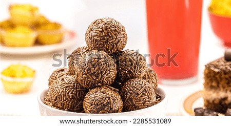 Brazilian children's party candy, brigadeiro, truffle or chocolate candy made with condensed milk and granulated chocolate, children's party candy , macro photography