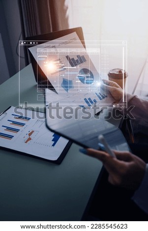 Project manager working with Gantt chart schedule to plan tasks and deliverables. Scheduling activities with a planning software, Corporate strategy for finance, operations, sales, marketing. Royalty-Free Stock Photo #2285545623