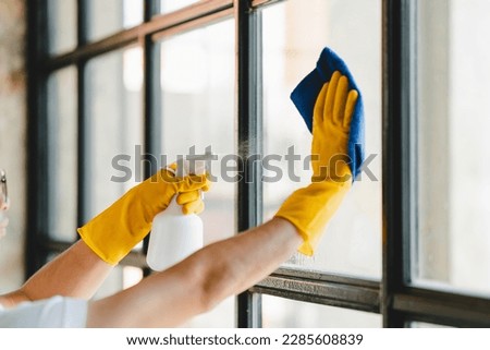 people doing cleaning are using cloths and spraying disinfectant Wipe the glass in the office room.
cleaning staff
cleaning maid Royalty-Free Stock Photo #2285608839