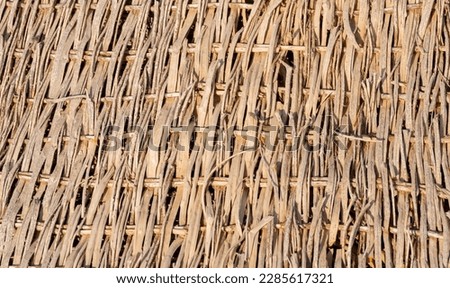 Reed braid on the shore of the Red Sea, photo zone for tourists