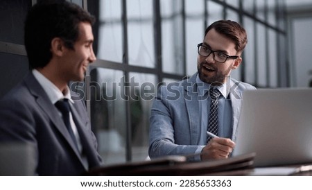 Serious and focused financier accountant on paper work inside office, Royalty-Free Stock Photo #2285653363