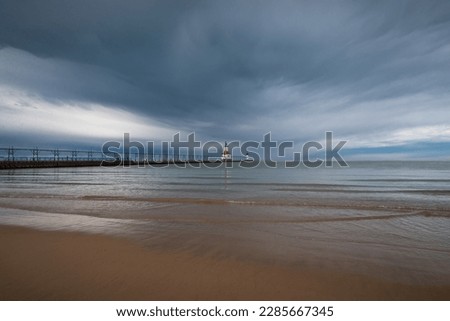 View of the St. Joseph Lighthouse on a stormy Spring morning.  St. Joseph, Michigan, USA. Royalty-Free Stock Photo #2285667345