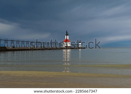 View of the St. Joseph Lighthouse on a stormy Spring morning.  St. Joseph, Michigan, USA. Royalty-Free Stock Photo #2285667347