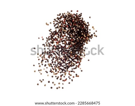 Black Pepper seeds fall down pour in group, Black Pepper float explode, abstract cloud fly. Black Peppercorn splash throwing in Air. White background Isolated high speed shutter, freeze motion