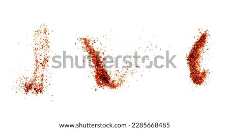 Isolated pepper splashes on a white background. Explosion. Chile. Paprika. Spice. Hot pepper powder. Taste of pepper. Mexican. Element for the design. Flying powder Royalty-Free Stock Photo #2285668485