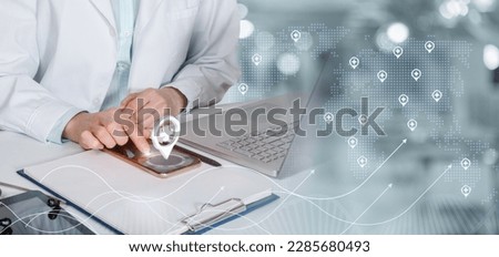 Medical worker clicks on the location of a medical institution using modern technology.