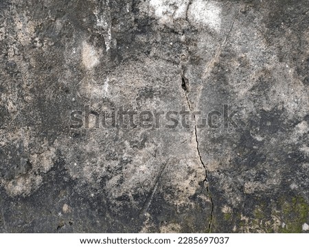 Old vintage crack wall texture background. Crack in concrete wall