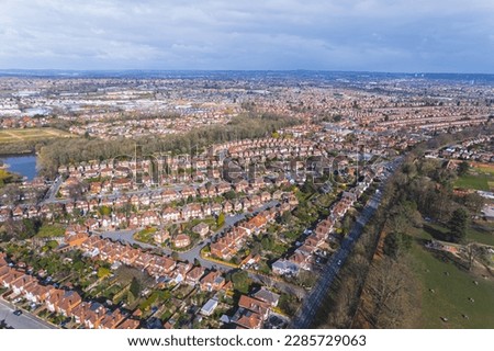 Wollaton - suburb and former parish in the western part of Nottingham, England seen from aerial view. Stunning red-tiled houses in the neighbourhood. High quality photo
