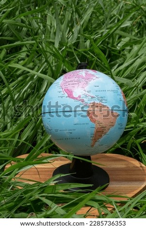 earth globe on green grass showing the South and North america- earth day