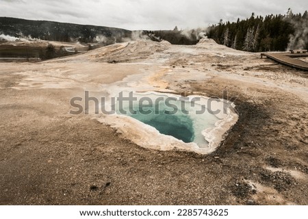 Old Faithful, Yellowstone National Park, Wyoming, USA - 05.30.2022: View of the Upper Geyser Basin. Royalty-Free Stock Photo #2285743625