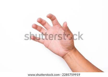 Close up of male hand reaching out ready to help or receive isolated on pink background. Helping hand outstretched for salvation.