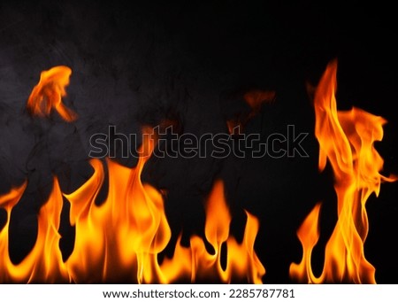 fuel flame png heat and danger of burning bbq explosion yellow-red flame isolated on rusty black steel plate background