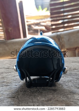 close up of blue mini helmet