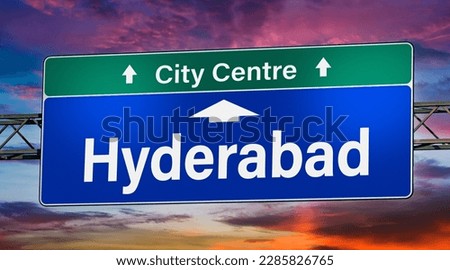 Road sign indicating direction to the city of Hyderabad.