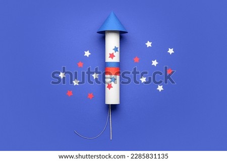 Firework rocket with stars for Independence Day on blue background