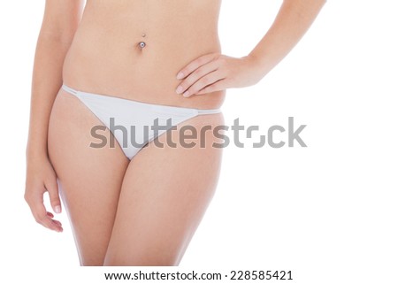 Attractive female body. All on white background.