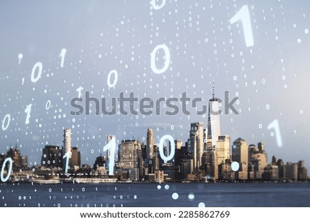 Double exposure of abstract virtual binary code hologram on New York city skyscrapers background. Database and programming concept