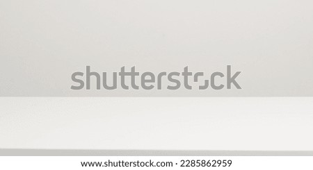 Empty white table top, mock up, white desk and white background. Royalty-Free Stock Photo #2285862959