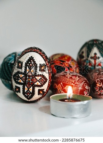 Hand painted Easter eggs. Traditional Easter decorations made by folk craftsmen from Bucovina, Romania. Painted Easter models, the sign of the cross and. Bunny decoration. Happy Easter