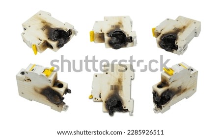 Several burned fuse boxes on a white background. Royalty-Free Stock Photo #2285926511