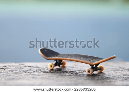 Concept image of skateboard and urban view