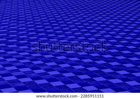 Medieval Tiled Floor.Cobble stone texture with a shallow depth of field for perspective background.The blue tint of the image.