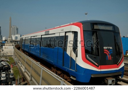 BTS Skytrain with Victory Monument in the Background Royalty-Free Stock Photo #2286001487
