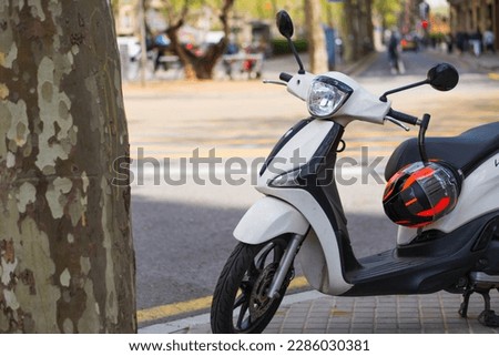 Scooter in the city center Royalty-Free Stock Photo #2286030381